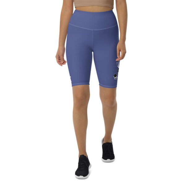 a person wearing blue high-waisted workout shorts shorts